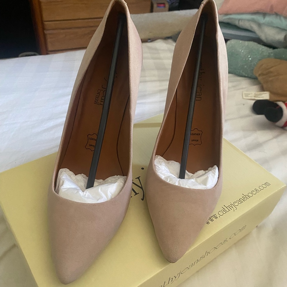 Nude suede pumps